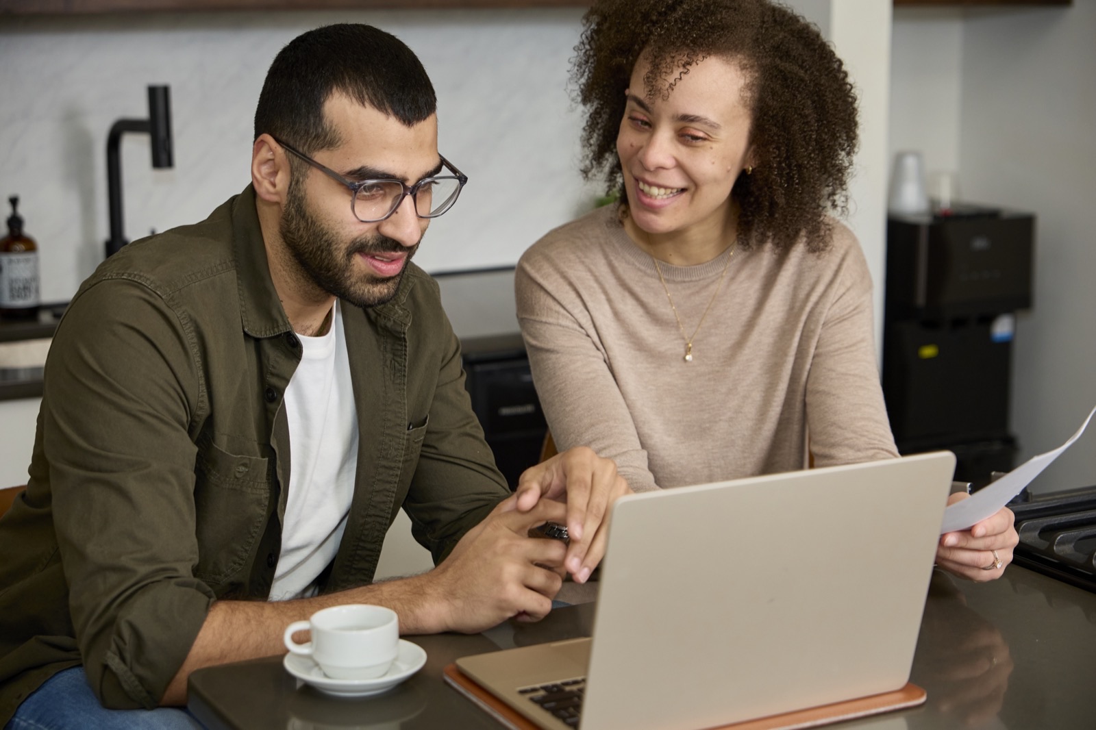 Couple consulting with Dr. Oluwole via telehealth