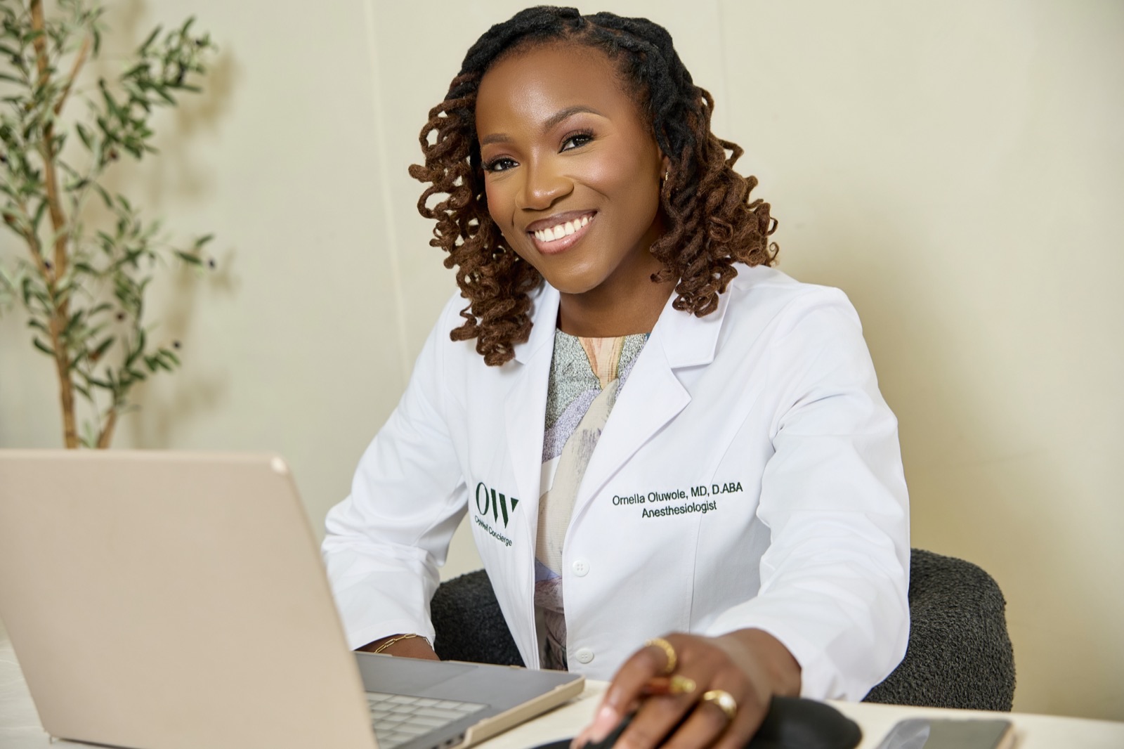 Dr. Oluwole at laptop